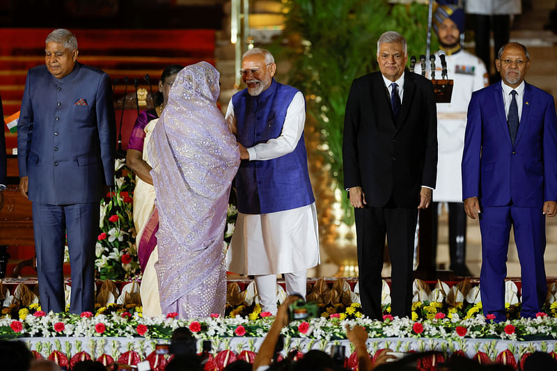 Bangladesh's Prime Minister Sheikh Hasina speaks with India's Prime Minister Narendra Modi, during a swearing-in ceremony at the presidential palace in New Delhi, India, 9 June 2024.