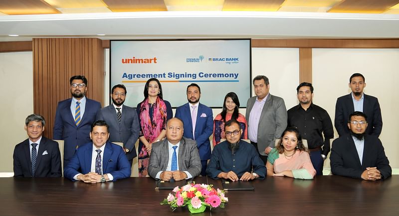 A glimpse of the agreement signing ceremony between BRAC Bank and Unimart.