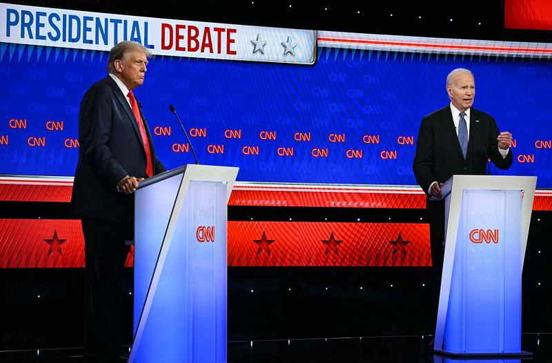 US President Joe Biden and former US President and Republican presidential candidate Donald Trump participate in the first presidential debate of the 2024 elections at CNN's studios in Atlanta, Georgia, on 27 June, 2024.