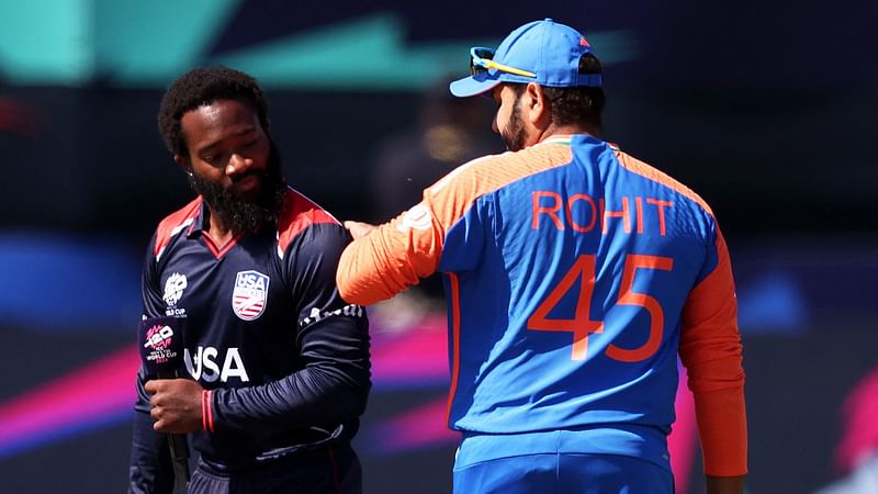 Aaron Jones of the USA interacts with Rohit Sharma of India ahead of the ICC Men’s T20 Cricket World Cup West Indies & USA 2024 match between USA and India at Nassau County International Cricket Stadium on 12 June, 2024 in New York, New York