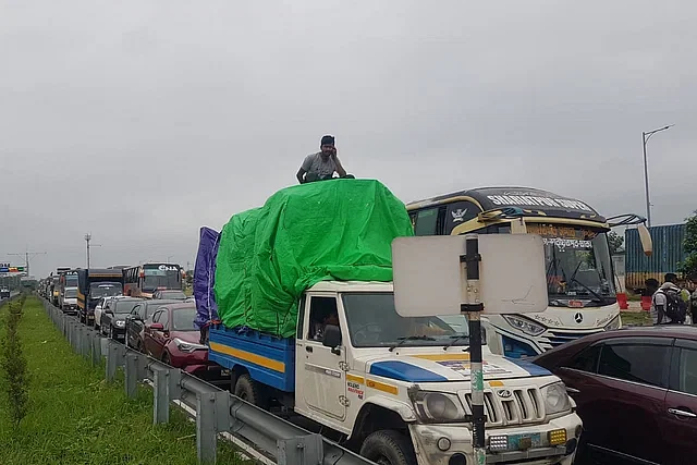 Vehicles are waiting at the Padma Bridge's toll plaza on 14 June, 2024.