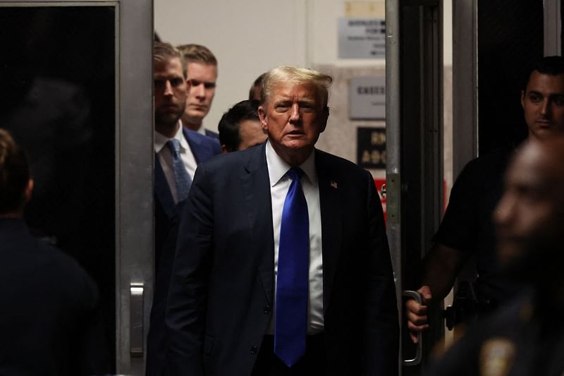 Former US President Donald Trump returns to the courtroom during his hush money trial at Manhattan Criminal Court on 30 May, 2024 in New York City