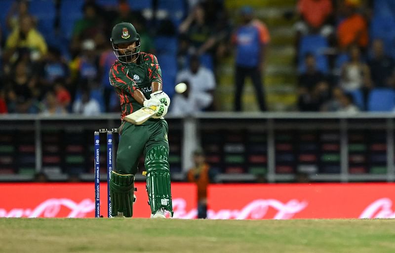 Bangladesh's Tawhid Hridoy hits a six during the ICC men's Twenty20 World Cup 2024 Super Eight cricket match between Australia and Bangladesh at Sir Vivian Richards Stadium in North Sound, Antigua and Barbuda, on 20 June, 2024