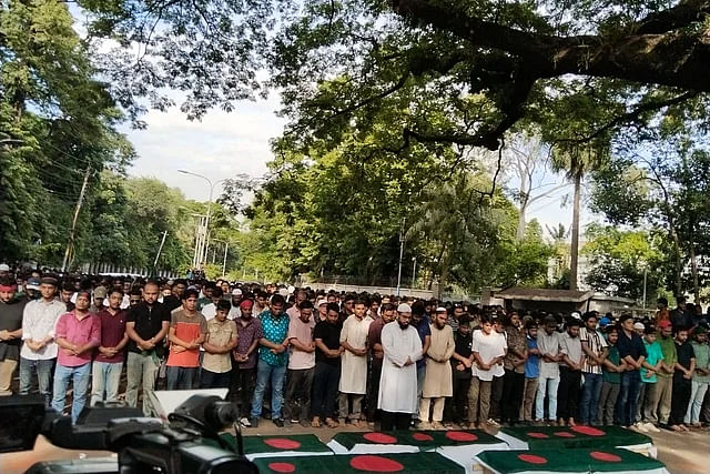 Quota reform protesters offer absentee funeral prayers on the Dhaka University campus in the afternoon on 17 July 2024.