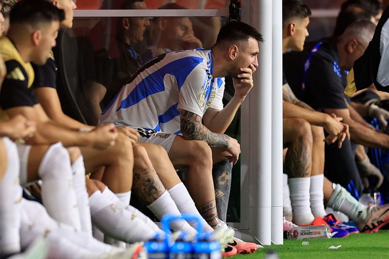 Lionel Messi of Argentina reacts after leaving the game with an injury during the CONMEBOL Copa America 2024 Final match between Argentina and Colombia at Hard Rock Stadium on July 14, 2024 in Miami Gardens, Florida