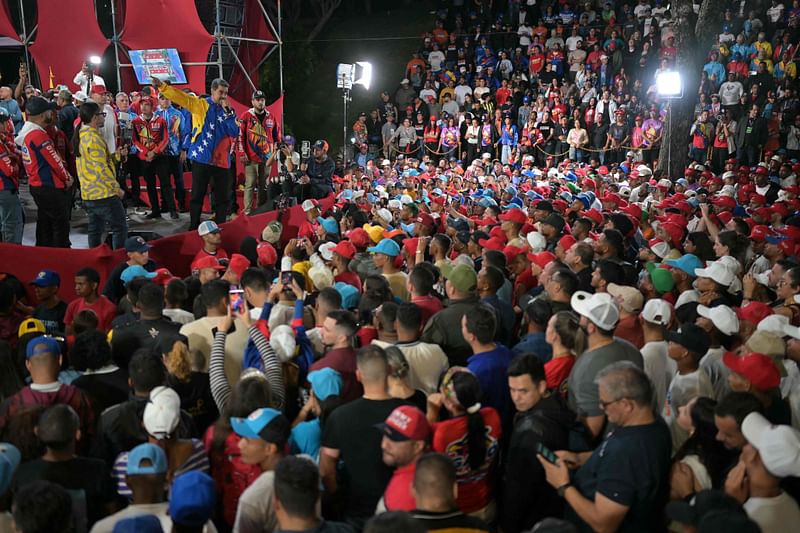 Venezuelan President and presidential candidate Nicolas Maduro reacts in front of his supporters following the presidential election results in Caracas on 29 July 2024.