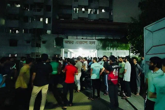 Students gather in front of Dhaka University's Amar Ekushey Hall. Thursday night