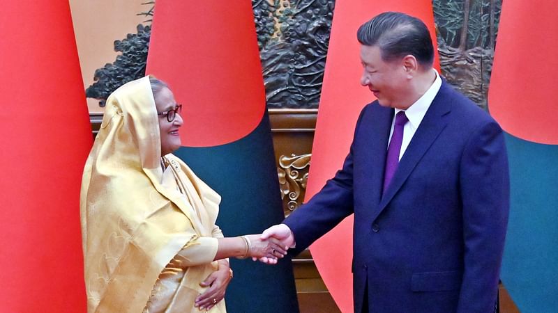 Bangladesh Prime Minister Sheikh Hasina and China President Xi Jinping shake hands in Beijing, China on 10 July 2024