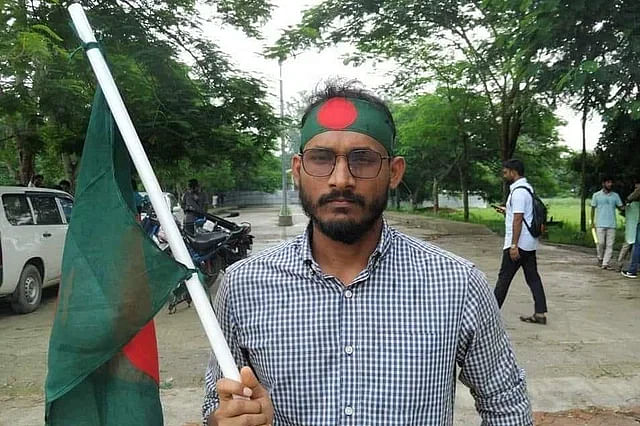 Abu Sayeed, who was killed. He took part in the quota reform movement carrying the national flag and wearing it around his head