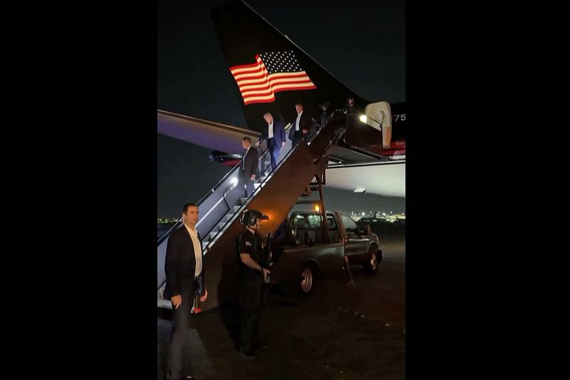 A screen grab obtained from footage released by a member of Donald Trump’s communications team shows the former US president disembarking from the plane upon his arrival in Newark, New Jersey, just hours after surviving an assassination attempt at a campaign rally in Butler, Pennsylvania, on 13 July, 2024