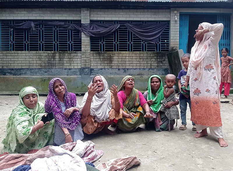 Relatives lament at the death of 10th grader Naima Sultana at their village home in Chandpur district