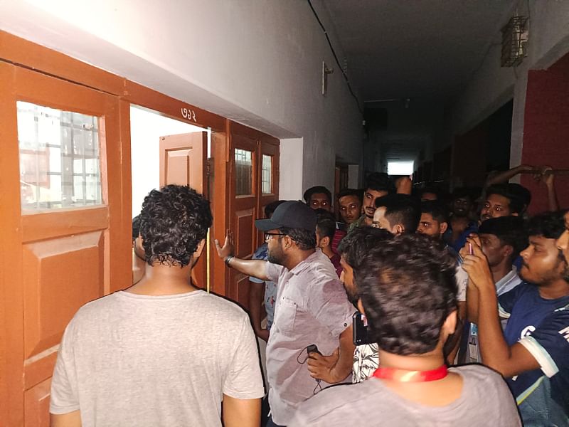 Leaders and activists of Bangladesh Chhatra League search room at the Madar Bux Hall of Rajshahi University. The photo was taken at 1:20am on Tuesday, 16 July 2024.