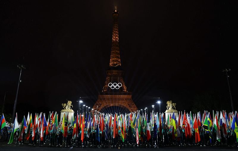 Paris 2024 Olympics - Opening Ceremony - Paris, France - 26 July, 2024. General view as flags of participating countries are carried during the opening ceremony.