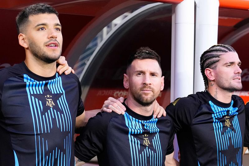 Valentin Carboni, Lionel Messi, and Rodrigo De Paul of Argentina line up prior to the CONMEBOL Copa America 2024 Group A match between Argentina and Peru at Hard Rock Stadium on 29 June, 2024