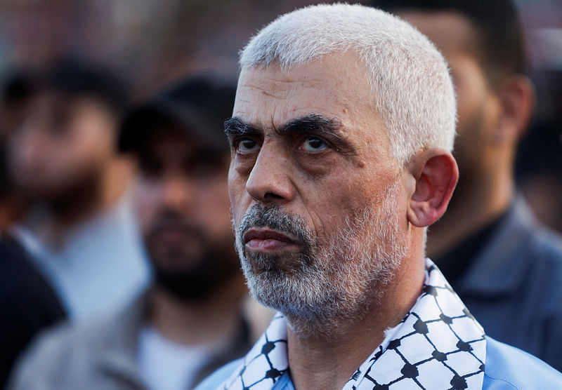 Hamas leader Yehya Al-Sinwar looks on as palestinians Hamas supporters take part in an anti-Israel rally over tension in Jerusalem's Al-Aqsa mosque, in Gaza City on 1 October 2022.