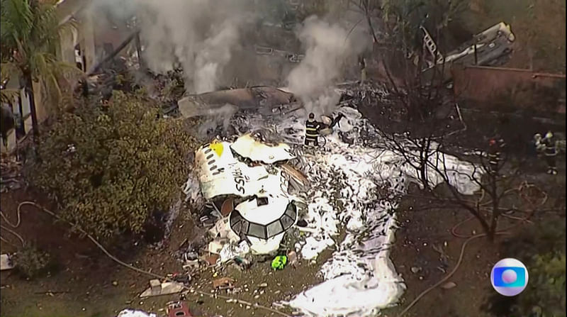 Screen grab taken for a video released by Globo TV showing an aerial view of the wreckage of an airplane that crashed with 61 people on board in Vinhedo, Sao Paulo State, Brazil, on 9 August, 2024