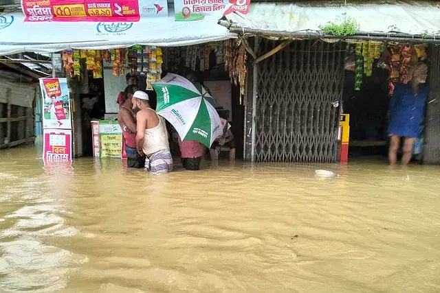 With heavy rains again within a matter of 24 hours and an onslaught of water, houses and roads in most low lying lands of Khagrachhari are under water. Picture taken Thursday (22 August 2024) morning at Mehedibagh