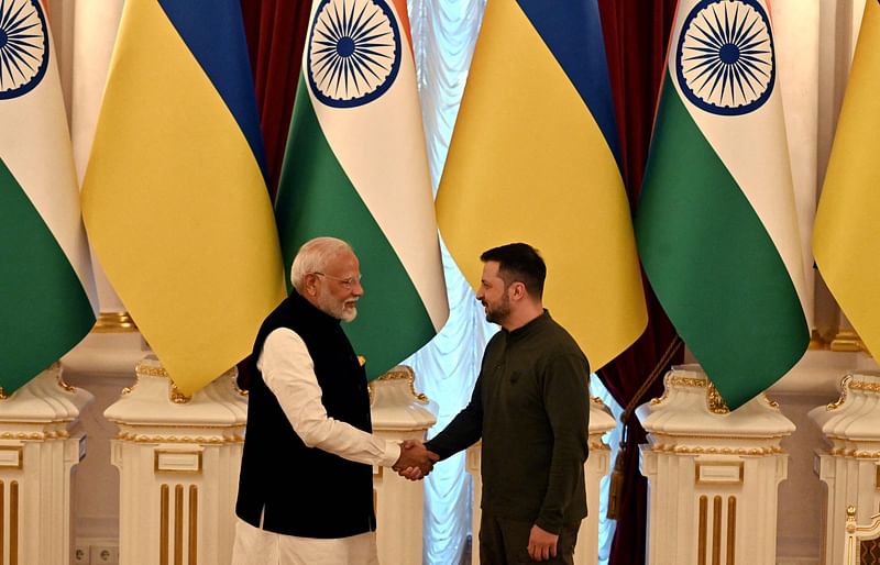 Ukrainian President Volodymyr Zelensky (R) and Indian Prime Minister Narendra Modi shake hands after their talks in Mariinskyi Palace in Kyiv, on 23 August 2024, amid the Russian invasion of Ukraine.