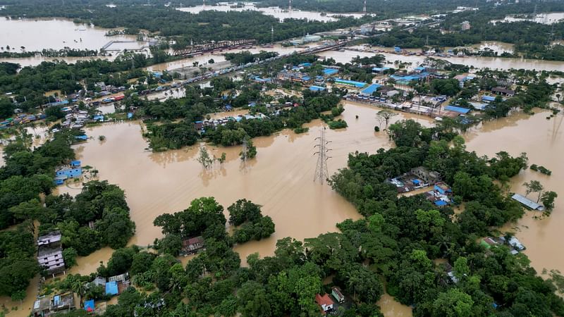 This aerial photograph shows deluged houses after floods in Feni on 23 August 2024