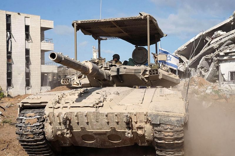 This handout picture released by the Israeli army on 28 August 2024 reportedly shows an Israeli main battle tank during operations to investigate and destroy a tunnel in the central Gaza corridor by the 16th Brigade