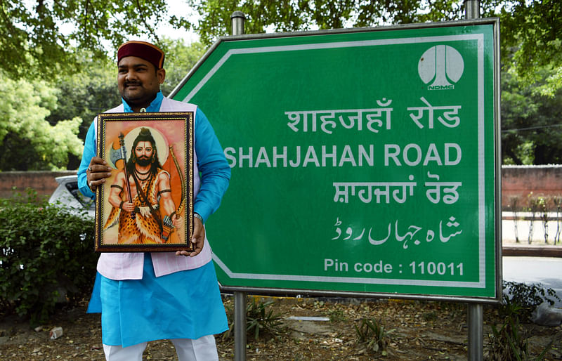 A Maharana Pratap Sena supporter holding a portrait of Lord Parshuram stages a protest demanding to rename Shahjahan road after Lord Parshuram, in New Delhi on 17 May 2022