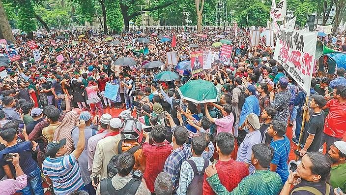 Thousands of people from different classes and professions participated in the 'Droha Jaatra' programme called by teachers and civil society. The rally demanded justice for the 'July massacre' at Central Shaheed Minar around 4:30 pm Friday