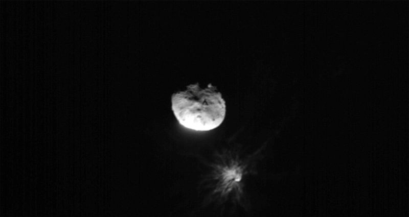 View of Didymos, Dimorphos, and the plume coming off of Dimorphos after the Double Asteroid Redirect Test, or DART mission, purposefully made impact, in this image acquired by ASI's LICIACube satellite just before its closest approach to the Dimorphos asteroid, 26 September, 2022.