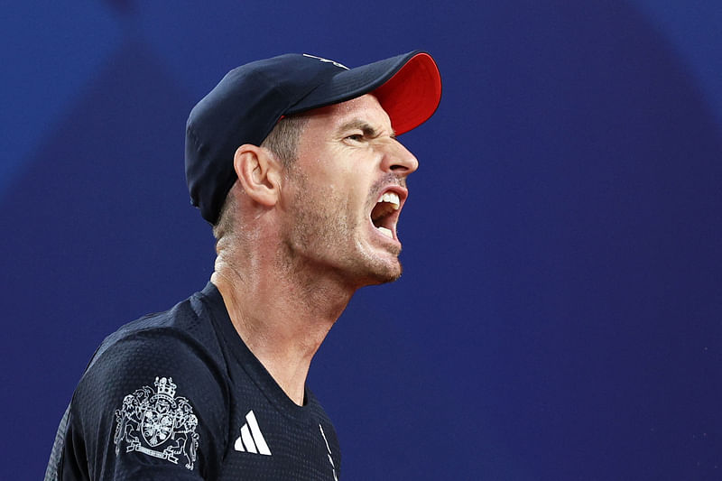 Paris 2024 Olympics - Tennis - Men's Doubles Quarterfinals - Roland-Garros Stadium, Paris, France - 1 August, 2024. Andy Murray of Britain reacts during his match with Daniel Evans of Britain against Taylor Fritz of United States and Tommy Paul of United States.