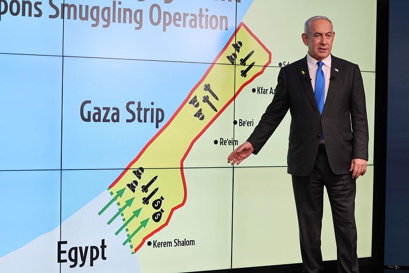 Israel's Prime Minister Benjamin Netanyahu stands in front of a map of the Gaza Strip as he speaks during a press conference at the Government Press Office (GPO) in Jerusalem on 4 September, 2024