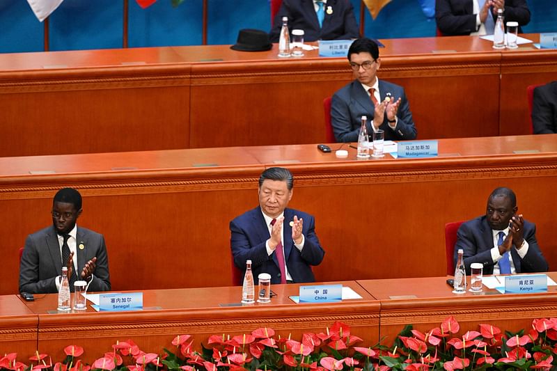 China’s President Xi Jinping (C) applauds during the opening ceremony of the Forum on China-Africa Cooperation (FOCAC) in Beijing’s Great Hall of the People on 5 September 2024