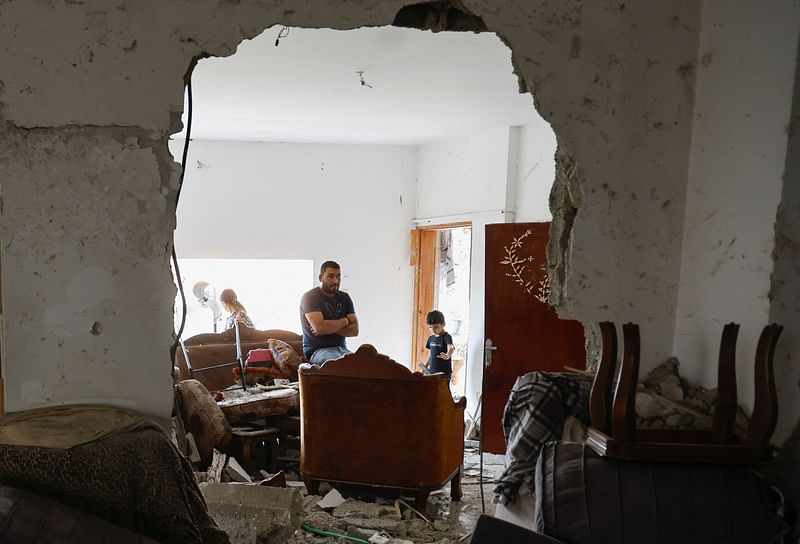 People react inside a damaged residence following a several day long Israeli-raid, in Jenin, in the Israeli-occupied West Bank, 6 September 2024.