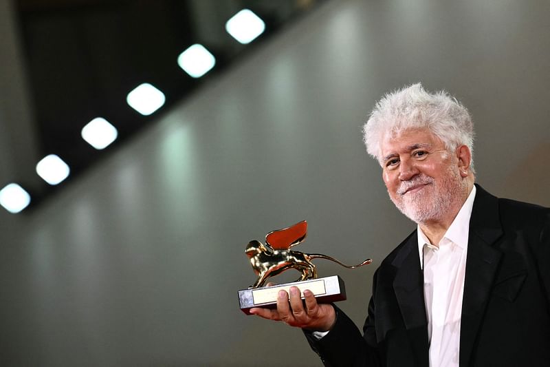 Spanish director Pedro Almodovar poses with the Golden Lion for Best Film he reveived for 'The Room Next Door' during a photocall following the award ceremony of the 81st Venice Film Festival on 7 September, 2024 at Venice Lido.