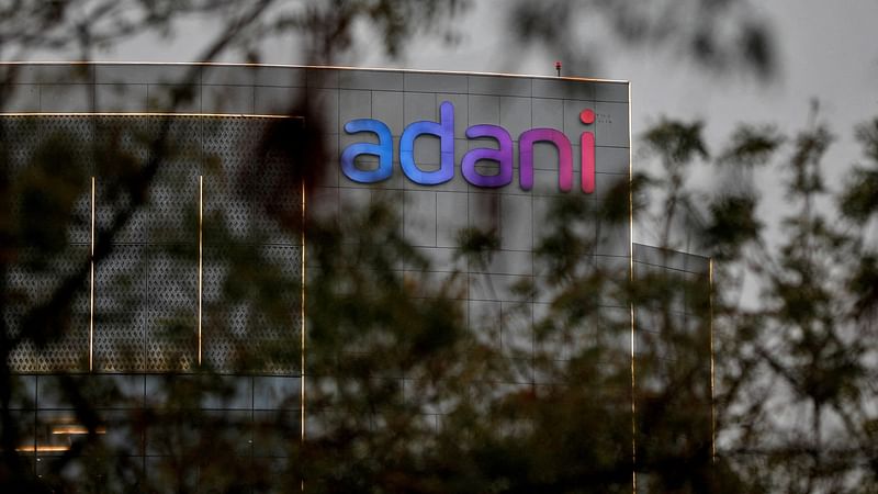 The logo of the Adani Group is seen on the facade of its Corporate House on the outskirts of Ahmedabad, India, 27 January 2023.