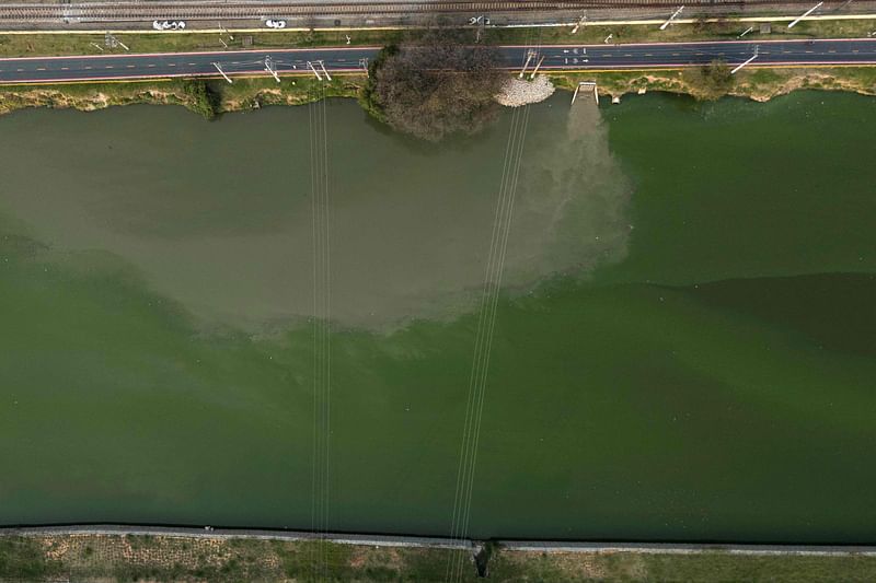 An aerial view of algae pollution at the Pinheiros River in Sao Paulo, Brazil, taken on 9 September, 2024.