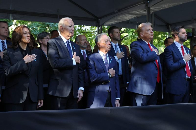 Democratic presidential nominee, U.S. Vice President Kamala Harris, U.S. President Joe Biden, former NYC mayor Michael Bloomberg, former U.S. President Donald Trump attend the annual 9/11 Commemoration Ceremony at the National 9/11 Memorial and Museum on September 11, 2024 in New York City