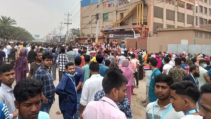 RMG workers demonstrate in the Palashbari area of Savar, Dhaka