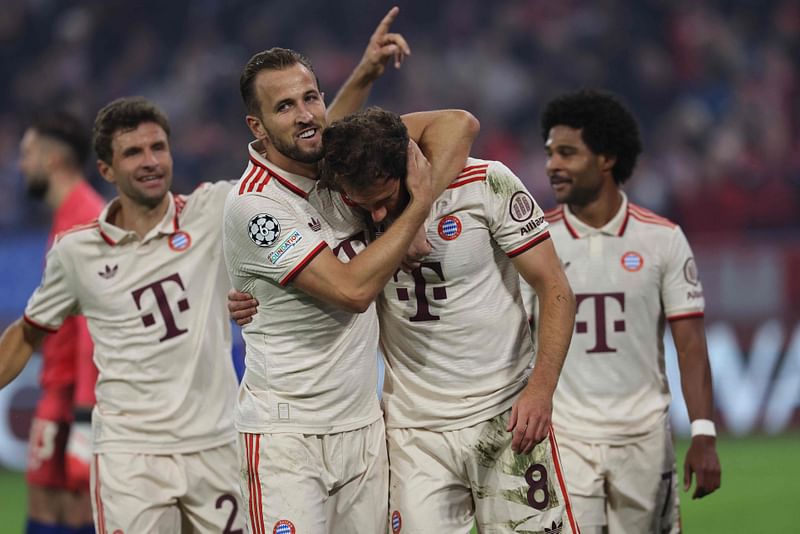 Bayern Munich's German midfielder #08 Leon Goretzka celebrates scoring the 9-2 goal with his teammates including Bayern Munich's English forward #09 Harry Kane during the UEFA Champions League football match FC Bayern Munich vs GNK Dinamo Zagreb in Munich, southern Germany, on 17 September, 2024.