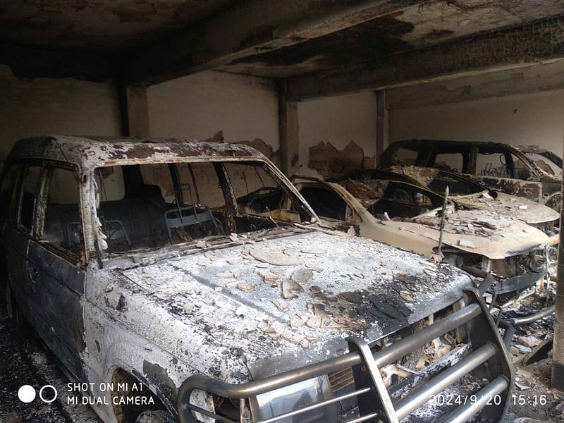 Photo shows torched vehicles at the Chittagong Hill Tracks Council in Uttar Kalindipur of Sadar upazila in Rangamati on 20 September 2024.