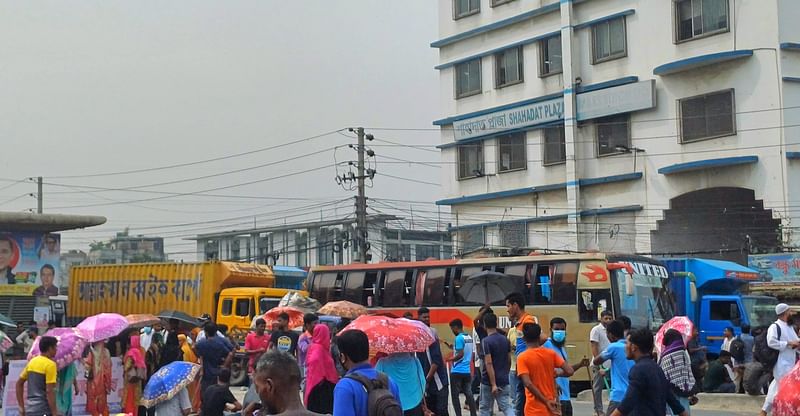 Workers of an apparel factory block the Dhaka-Mymensingh highway in the Kha Para area of Tongi in Gazipur on 23 September 2024 demanding the payment of their arrears.