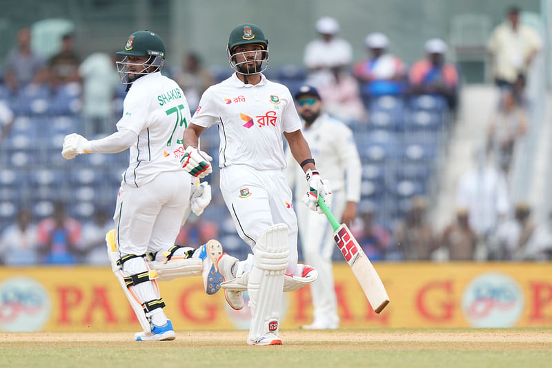 Bangladesh's captain Najmul Hossain Shanto, right, and Shakib Al Hasan run between the wickets on the fourth day of the first cricket test match between India and Bangladesh, in Chennai, India, Sunday, 22 September 2024.