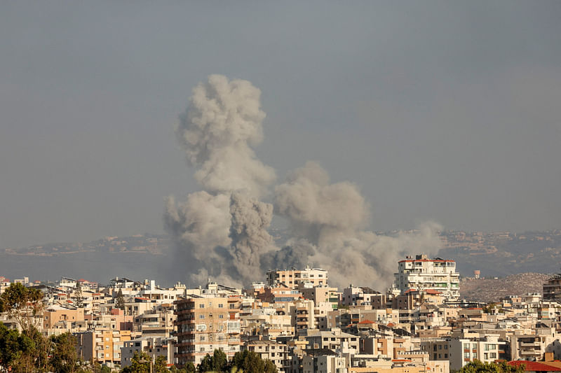 Smokes rise, amid ongoing cross-border hostilities between Hezbollah and Israeli forces, in Tyre, southern Lebanon on 23 September 2024.