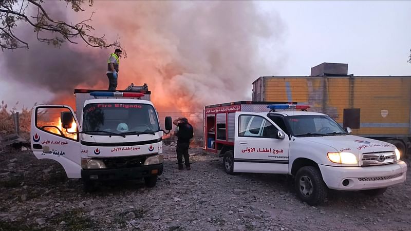 Rescuers rush to the scene of an Israeli airstrike that targeted the southern Lebanese village of Abbasiyeh on 24 September, 2024