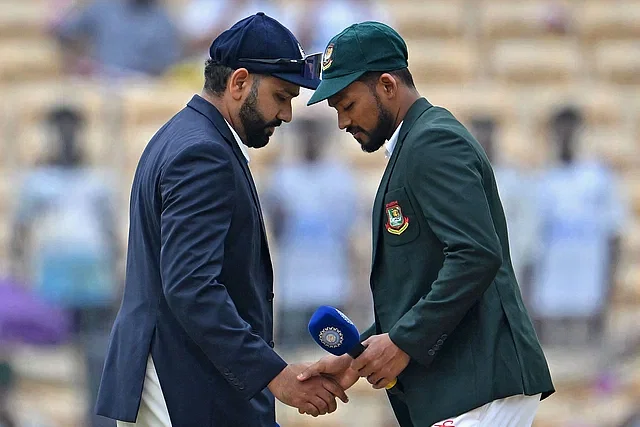 Bangladesh skipper Najmul Hossain and Indian skipper Rohit Sharma shake hands after the toss before the first Test