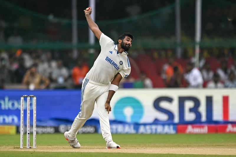 India's Jasprit Bumrah bowls during the first day of the second Test cricket match between India and Bangladesh at the Green Park Cricket Stadium in Kanpur on 27 September, 2024