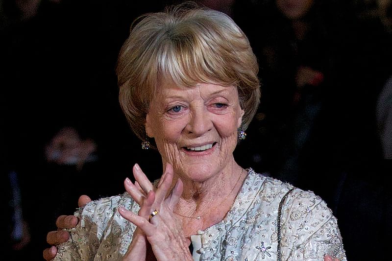 A file photo taken on 15 October, 2012, shows British actress Maggie Smith on the red carpet as she arrives to attend the premiere of 'Quartet' during the 56th BFI London Film Festival in London.