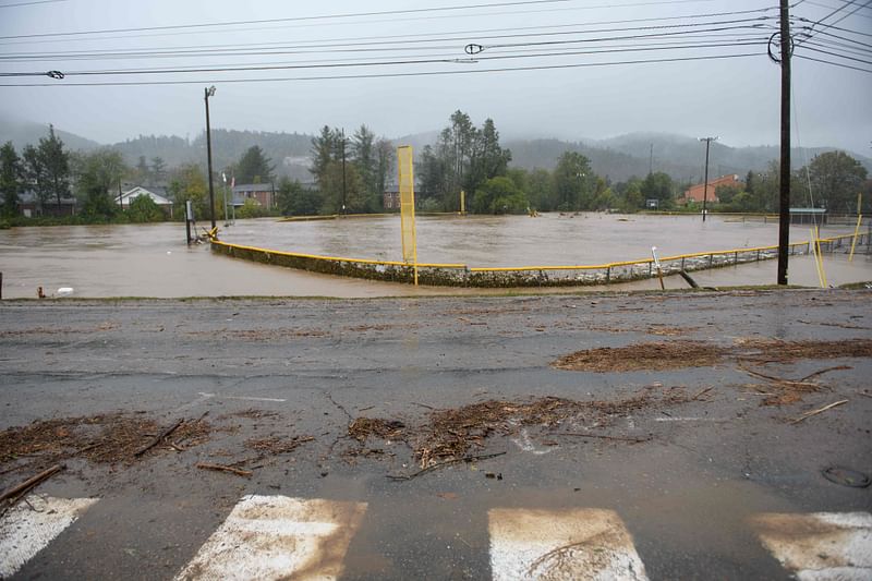 An athletic field is flooded after heavy rain and filling with debris on 27 September, 2024 in Boone, North Carolina.