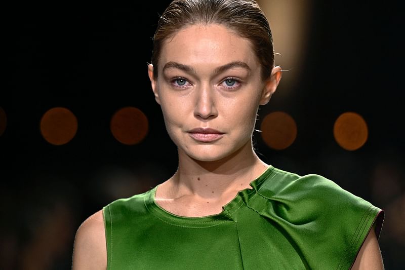 US super model Gigi Hadid presents a creation by Victoria Beckham for the Women Ready-to-wear Spring-Summer 2025 collection as part of the Paris Fashion Week, in Paris on 27 September, 2024.