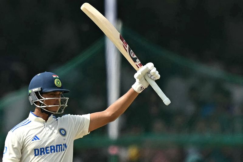 India’s Yashasvi Jaiswal celebrates after scoring a half-century (50 runs) during the fifth and final day of the second Test cricket match between India and Bangladesh at the Green Park Cricket Stadium in Kanpur on 1 October 2024