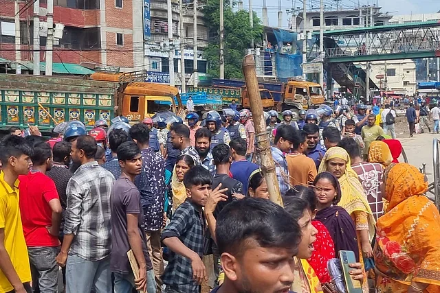 RMG workers block the Nabinagar-Chandra highway in the morning on 2 October, 2024.