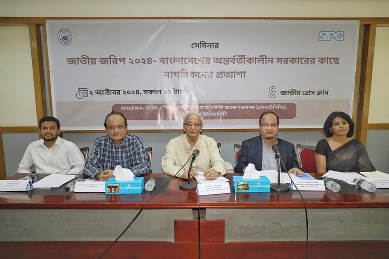 Speakers release the findings of the poll ‘National Poll 2024: Citizens’ Expectations to the Interim Government of Bangladesh’ at the National Press Club in Dhaka on 2 October 2024.